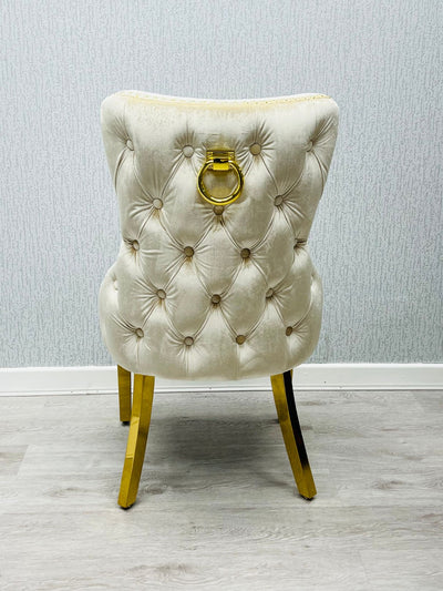 Louis Gold Marble Dining Table With Shimmer Cream Gold Ring Knocker Dining Chairs